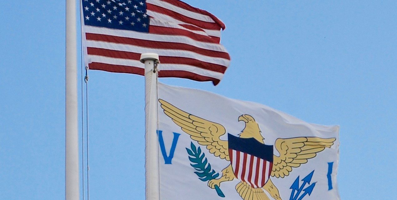 United States and US Virgin Islands flags. Photo Credit: Matt Wade