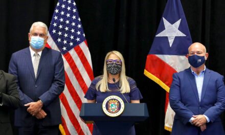 Officials in Puerto Rico try to balance public health precautions with economic stability