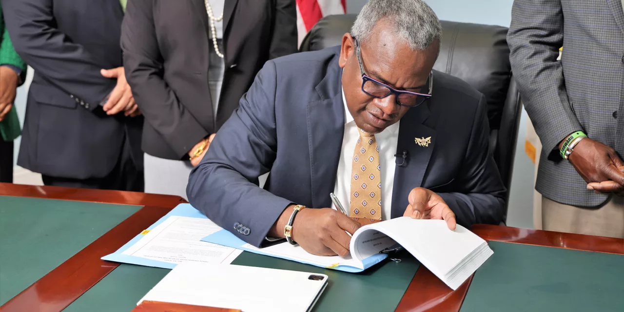 Governor Bryan signs the Virgin Islands Cannabis Use Act. Photo credit: US Virgin Islands Government House